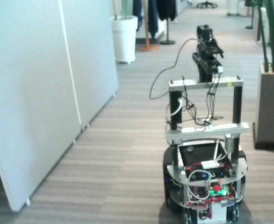 Mobile robot navigating a real indoor hallway during risk-sensitive navigation experiments